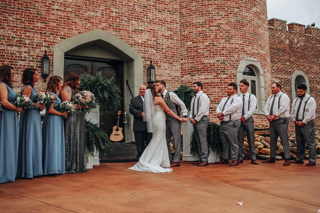 bride and groom's first kiss